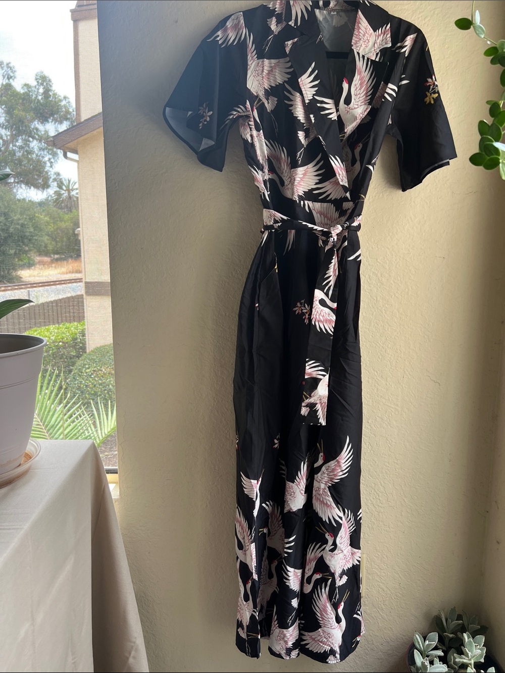 Black Crane-Print Cropped Jumpsuit with Tie Waist